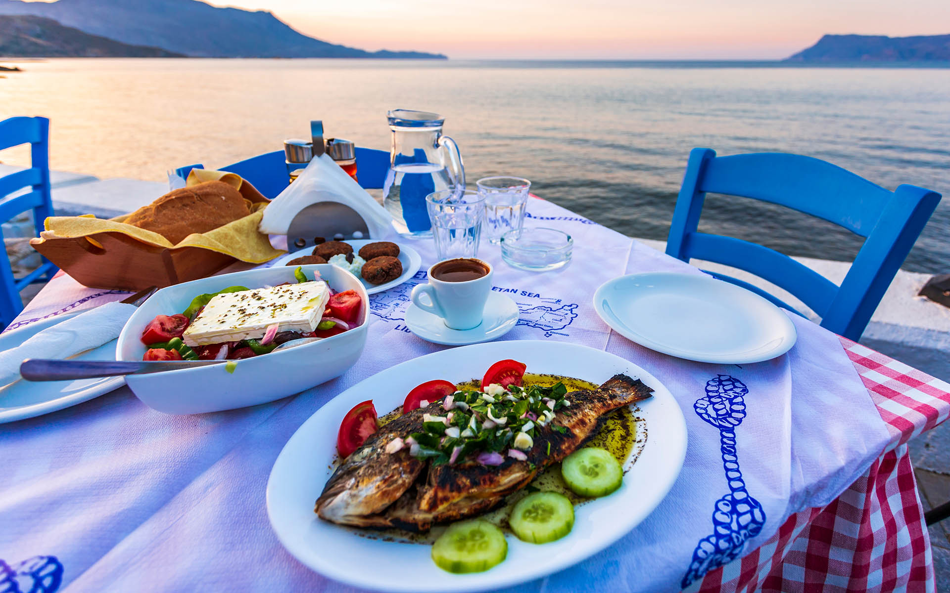 Traditional Cretan Dorada fish with Greek salad, Kissamos, Crete, Greek Islands, Greece, Europe