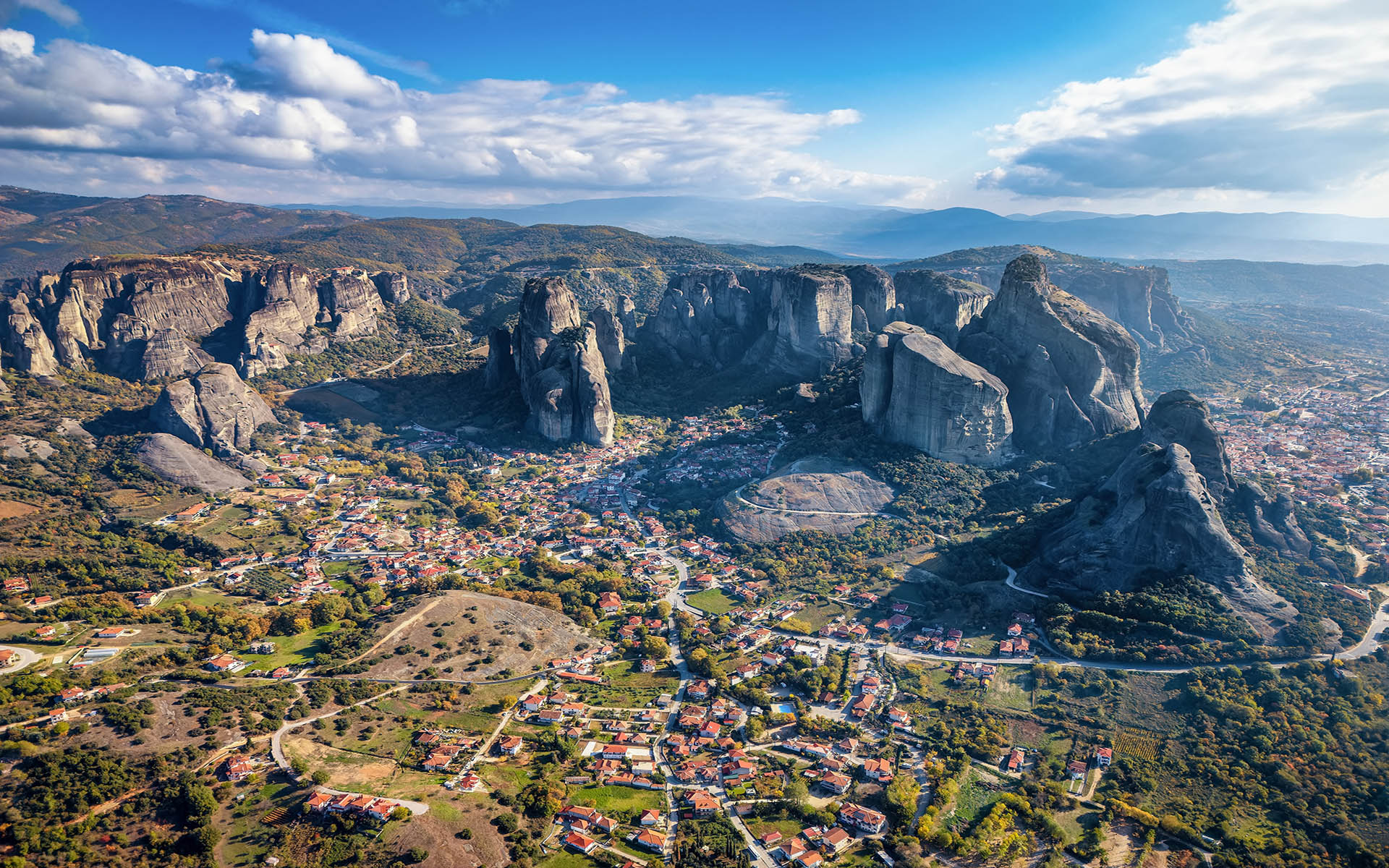 Aerial view of the mountains of Meteora, Kalampaka, Greece, with the village Kastraki below in the valley