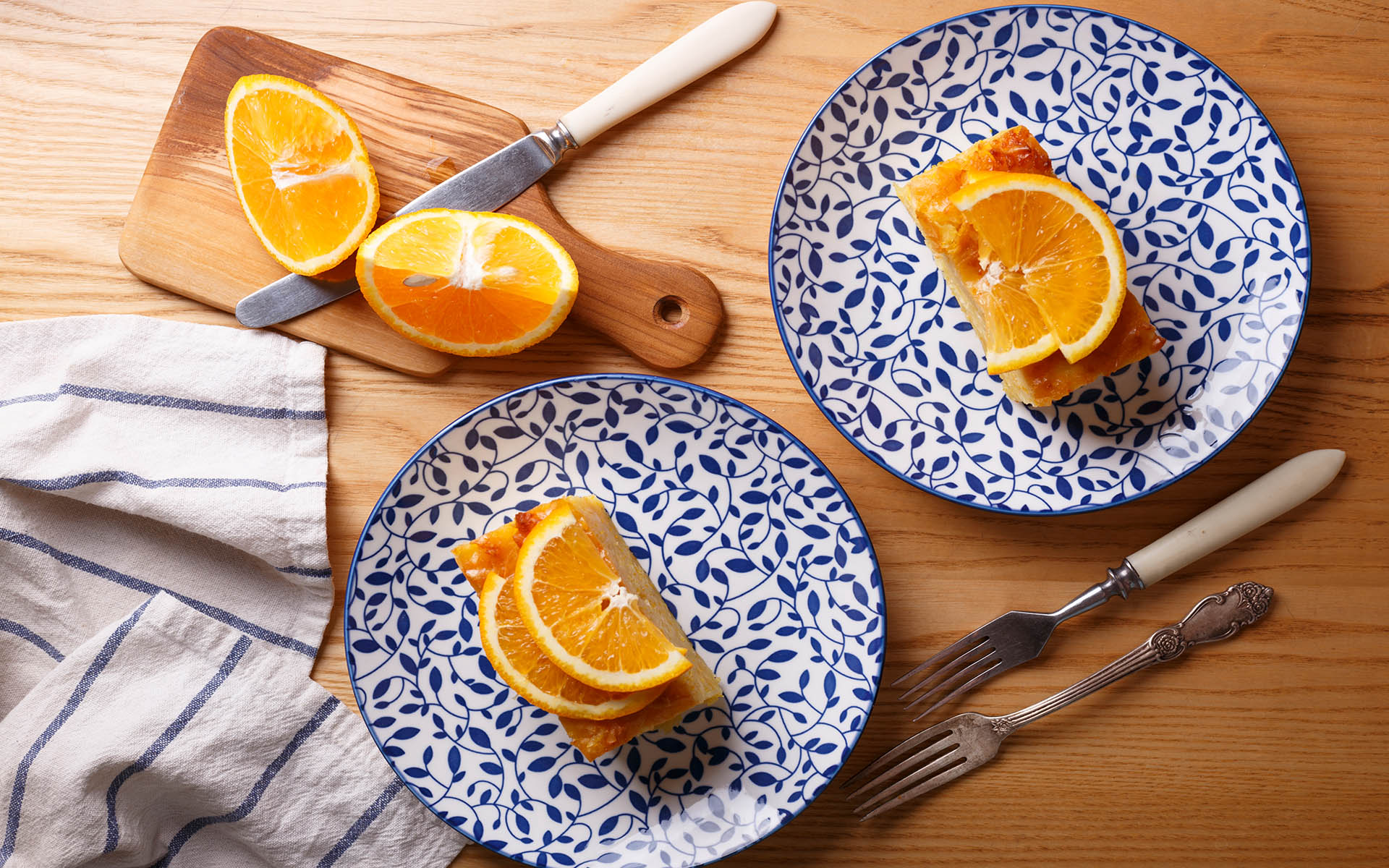 traditional greek orange pie on beautiful plates - Portokalopita